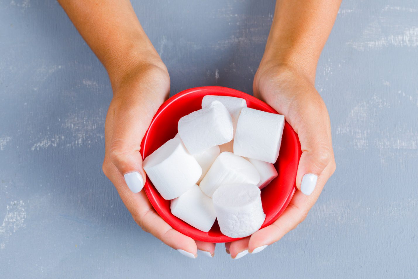 C:\Users\Talha\Downloads\hands-holding-sweet-stuff-bowl.jpg