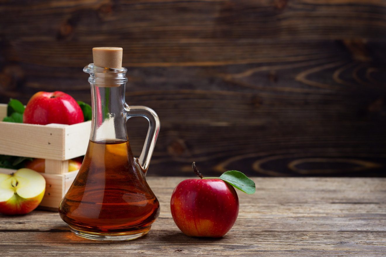 C:\Users\Dell\Downloads\apple-cider-vinegar-fresh-red-apple-wooden-background.jpg