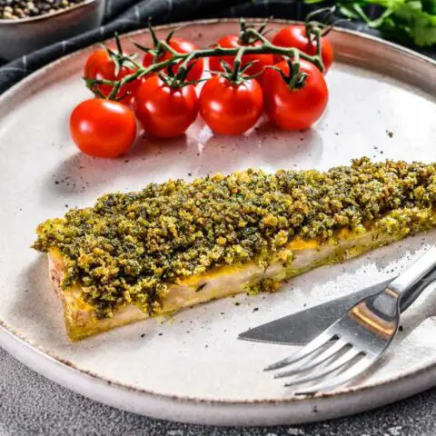 keto Baked Cod Fillet in Pistachio Crust with Sautéed Spinach and Sage Flavored Butter