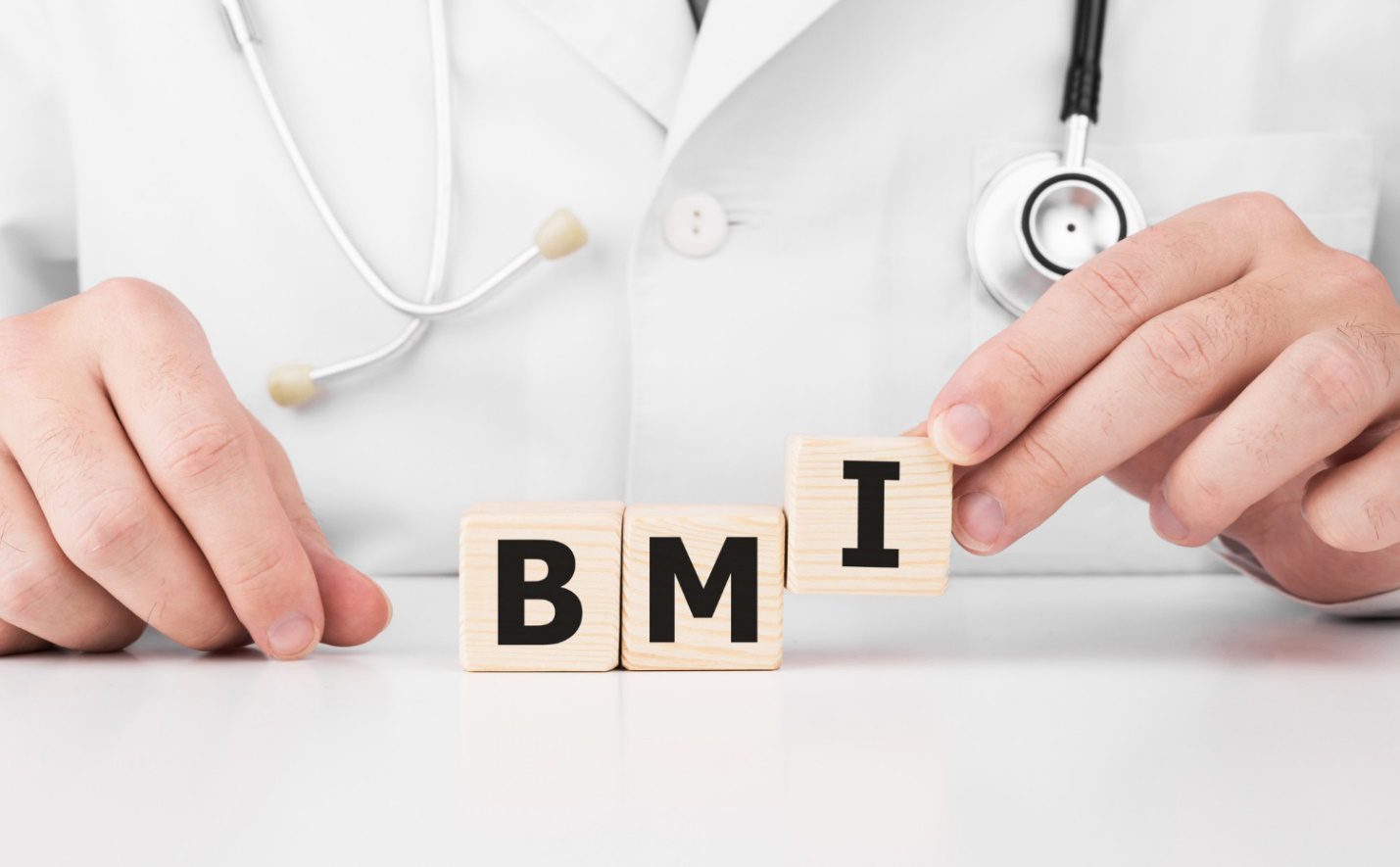 C:\Users\Dell\Downloads\doctor-holds-wooden-cubes-his-hands-with-text-bmi.jpg