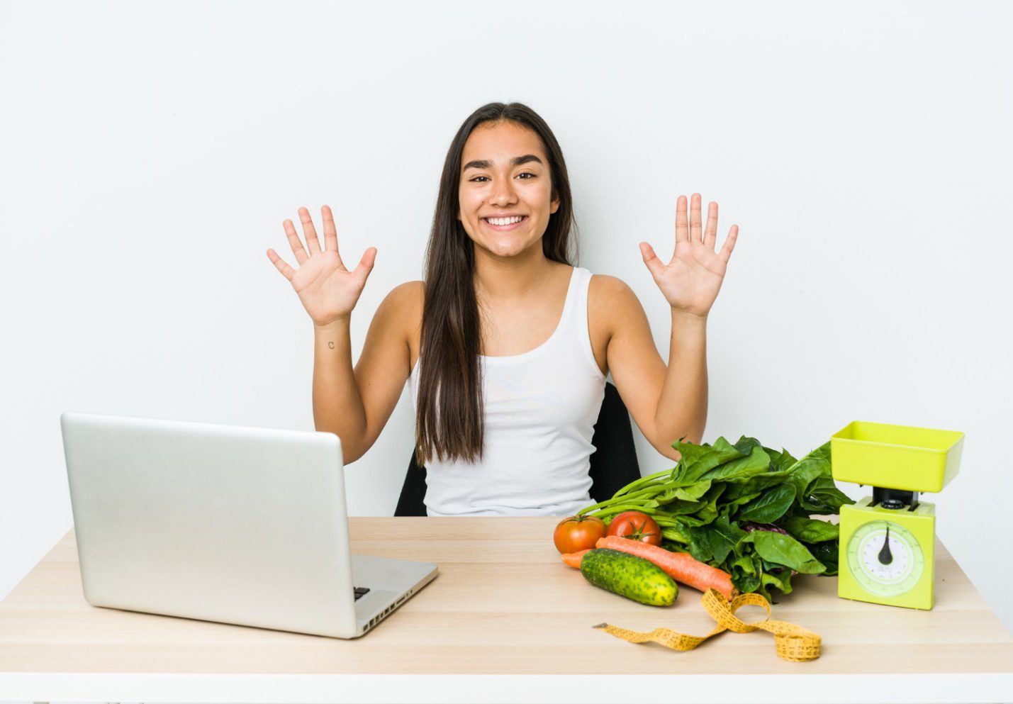 C:\Users\Dell\Downloads\young-dietician-asian-woman-isolated-white-wall-showing-number-ten-with-hands.jpg