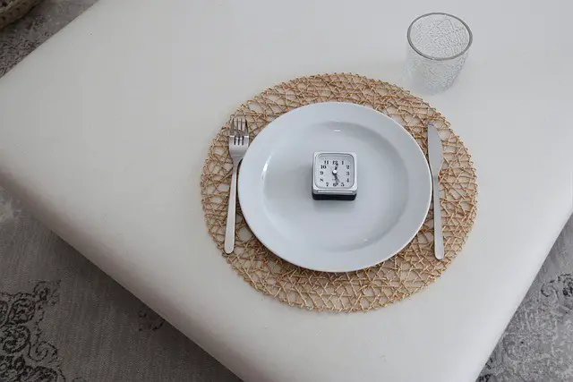 clock, plate, cutlery