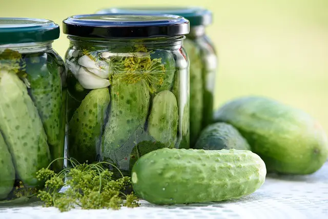 pickled cucumbers, homemade preserves, jars